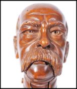 PAIR OF 19TH CENTURY WOODEN NUTCRACKERS - POLITICAL INTEREST