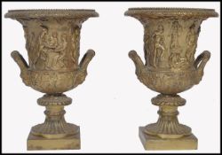 PAIR 19TH CENTURY GILT BRONZE CLASSICAL TWIN HANDLED URNS