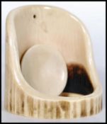 A 19TH CENTURY VICTORIAN CARVED IVORY POCKET WATCH STAND