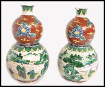 PAIR 19TH CENTURY CHINESE FAMILLE ROSE / VERTE GOURD VASES