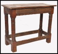 A JACOBEAN 17TH / 17TH CENTURY COUNTRY OAK JOINT STOOL