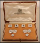 A fantastic 9ct white gold and sapphire gentlemen's cufflink and collar stud set. Each piece of