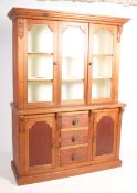 A Victorian 19th century country pine Welsh dresser. Raised on a plinth base with a central bank