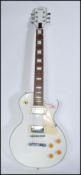 A vintage retro 20th century Swift Gibson style electric guitar in white. Measures 102cm- high.