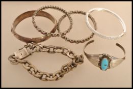 A group of sterling silver and other silver white metal jewellery to include a heavy silver curb