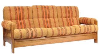 C. D. Pierce & Son LTD - A retro vintage teak wood sofa daybed. The daybed comprising of a teak flat
