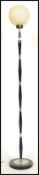 A retro mid century, circa 1960's standard lamp - floor lamp of ebonised finished being raised on