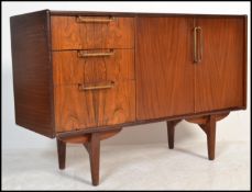 A vintage retro 20th Century teak wood sideboard / credenza, double cupboard with a bank of three