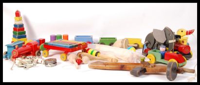 ASSORTED VINTAGE WOODEN TOYS AND GAMES.