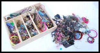 A collection of costume dress jewellery to include bracelets, bangles, necklaces, earrings etc.
