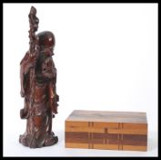 An early 20th century Japanese specimen wood puzzle box depicting mount Fujiyama along with a 20th