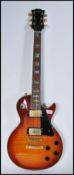 A vintage retro 20th century Westfield Gibson style electric guitar having sunburst body with