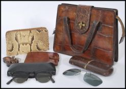 A group of vintage fashion items to include a crocodile / alligator skin hand bag, Buffalo calf
