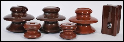 A group of six ceramic Industrial 20th century pylon electricity tops