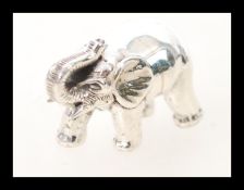 A silver figurine of a bull elephant marked 925 sterling. Weight 20.5g.