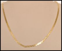A hallmarked 9ct gold fancy link necklace chain having a fold over clasp. Weighs 10 grams.