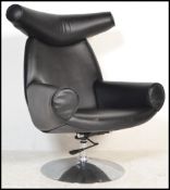 A superb contemporary black leather vinyl lounge / easy chair / armchair in the manner of the Hans
