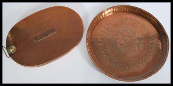 A 19th century copper charger / decorative plate w