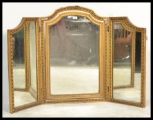 An early 20th Century Edwardian gilt triptych mirr