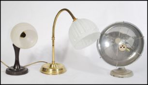 A collection of three vintage / retro 20th Century lamps to include a bakelite pedestal goose-neck