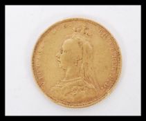 A 19th century Victorian Gold sovereign coin dated 1890. Weighs 7.98 grams.
