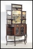 An Edwardian mahogany mirror back sideboard Chiffonier. The base with shaped end shelves and central