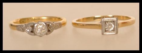 Two 20th century rings to include a stamped 18ct & platinum metal ring with a brilliant cut white