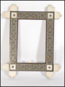 A 19th century Indian Anglo-Colonial vizagapatam picture frame having ivory panel edges with micro-