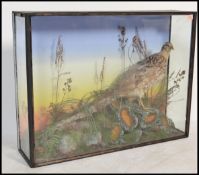 Taxidermy - Phasianus Colchious, an early 20th century taxidermy example of a Pheasant hen,