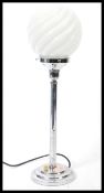 A art deco 1920's style chrome table lamp with original push button to circular stepped base with