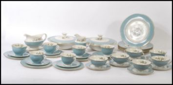 A Royal Doulton ' Rose Elegans ' part dinner service to include lidded tureens, plates, bowls etc
