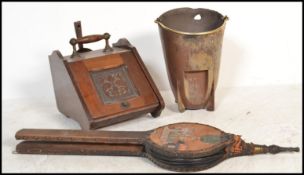 A 19th century Victorian mahogany fireside compendium coal  box having carved front panel and turned