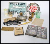 A collection of WWII second world war era and transport related items, to include two brass bomb