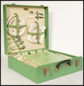 A vintage 20th Century green vinyl cased Brexton picnic set, all original contents within to include