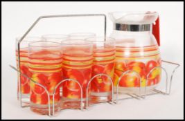 A vintage 20th century French glass mulled cider set consisting of jug and six tall glasses in