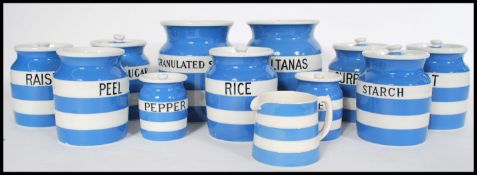 A selection of vintage T G Green & Co Cornishware condiment storage jars in blue and white, labelled