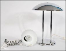A retro 20th Century chromed mushroom desk lamp, fitted with a mushroom shade raised on a pedestal