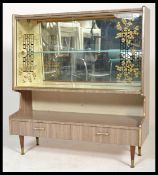 A 1960's Italian melamine / formica upright china