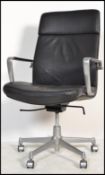 A vintage 20th Century black leather and chrome swivel executive office chair by Kusch and Co