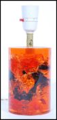 A retro vintage mid century Shatterline amber type resin lamp base in orange. The vase of