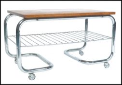 RETRO 20TH CENTURY TUBULAR CHROMED AND TEAK COCKTAIL TABLE