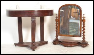 A 19th century Victorian mahogany Duchess washstand with a half moon / demi-lune marble top being