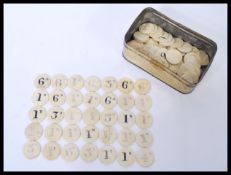 A collection of approx 80 plus early 20th century bovine bone gaming tokens counters of circular