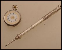 A early 20th century 925 silver pocket / fob watch with traditional floral engraving, roman numerals