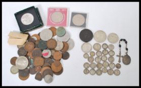 A collection of coins dating from the 18th century to include Georgian cartwheel coin, Victorian