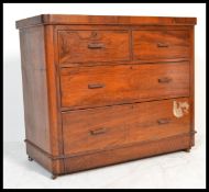 A 19th Century Victorian flame mahogany chest of drawers, two short drawers over two long with