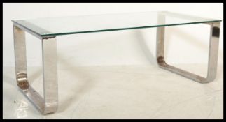 A retro mid 20th century tubular chrome and glass