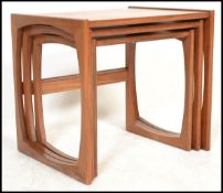 A G-Plan retro teak wood 1970's graduating nest of tables in the Quadrille pattern. The tables