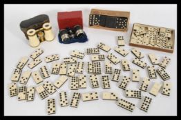 A selection of assorted dominoes to include an ear