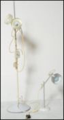 A vintage retro 20th Century two spot floor standing standard lamp in original white colourway